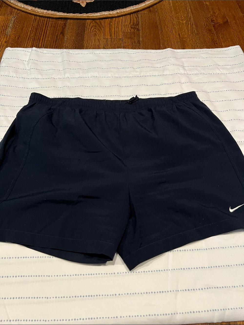 Nike Navy Blue Running Shorts with White Swoosh